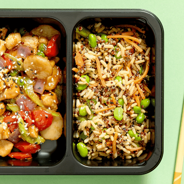 Freshly made, healthy meal prep featuring cashew chicken stir fry, perfect for any time of day in a microwavable container