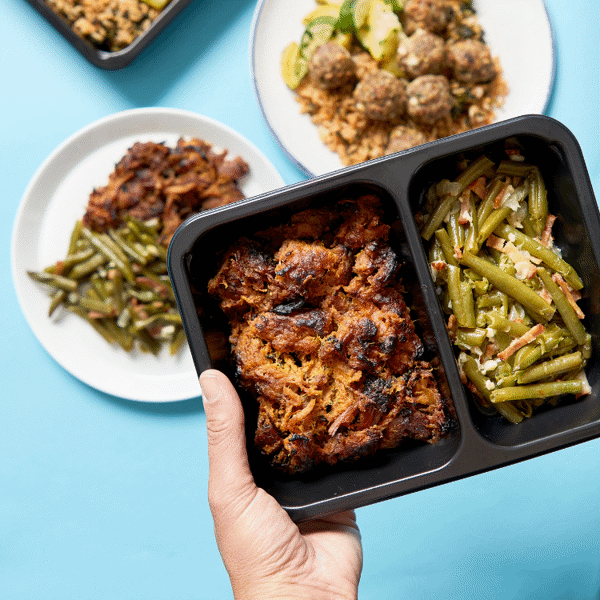 Ready-to-eat, gluten-free meal prep with Fitlife Foods' Carolina Pulled Pork with green beans served in a BPA-safe package