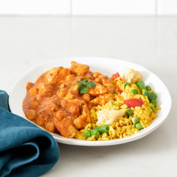 Dairy-free Chicken Tikka Masala: curry with tender chicken, marinated in regional spices, slow-simmered in creamy tomato-coconut puree.