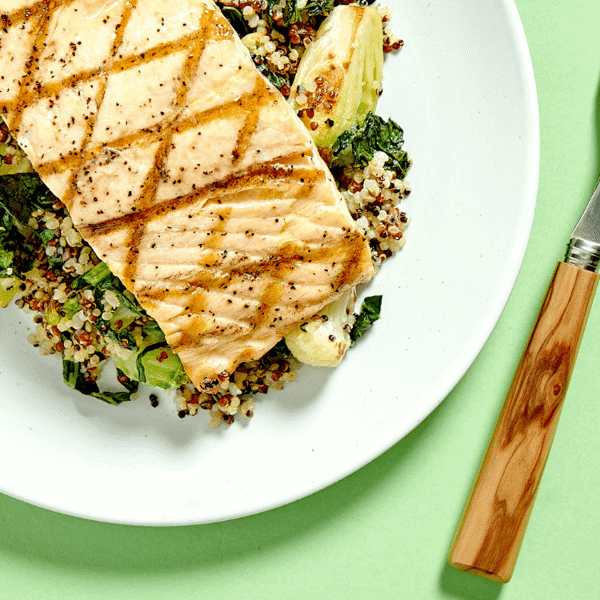 Dairy-Free meal with Simply Grilled Salmon—Atlantic salmon, served with quinoa and a mix of roasted Brussels sprouts, cauliflower, and kale.