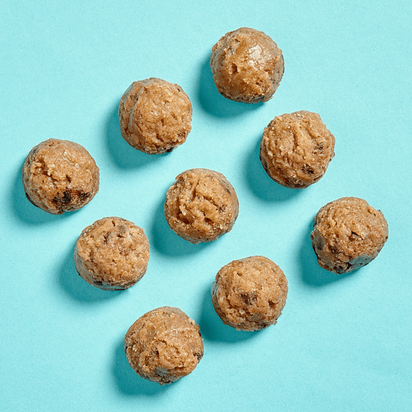 Gluten-Free, Vegetarian Cookie Dough Balls are rounded Fitsnacks with a golden-brown exterior and made of fresh ingredients