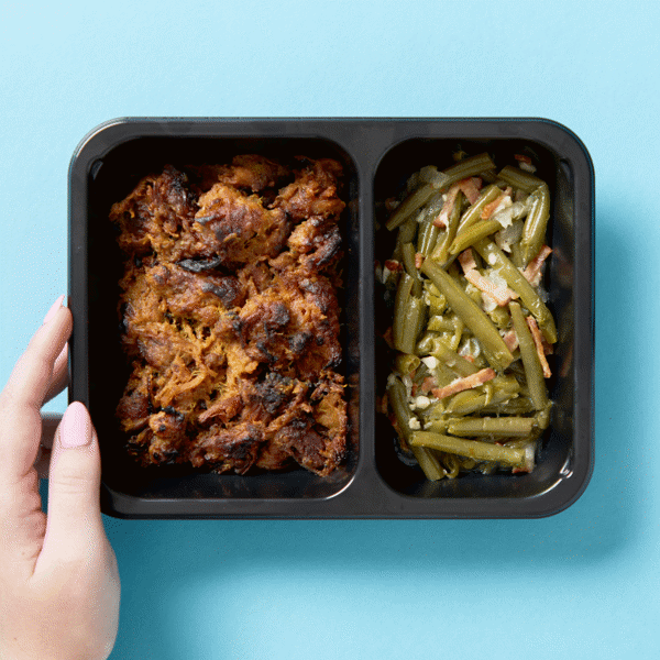 Healthy, High-Protein Pulled Pork with gluten-free mustard glaze and southern-style green beans with chicken bacon, herbs, and spices.