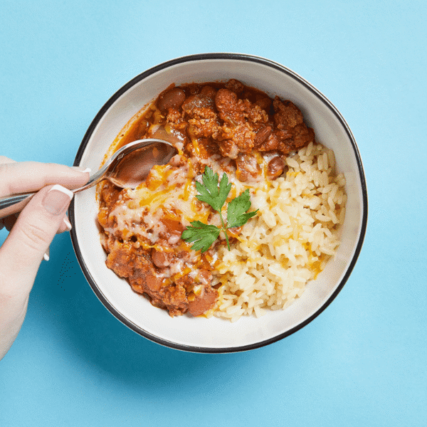 reshly prepared, Low Carb, Gluten-Free Protein Turkey Chili. Packed with lean ground turkey, pinto beans, and veggies in a bowl