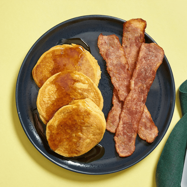 Pancakes made with roasted sweet potatoes paired with all-natural, low-sodium chicken bacon and a side of 100% pure Vermont maple syrup.