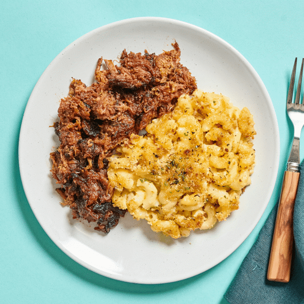 Fitlife Food's  BBQ beef brisket with a side ofin a Kansas City-style sauce, with creamy butternut and cheddar mac & cheese.